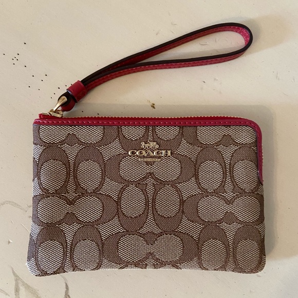 Coach red and brown wristlet. - Picture 1 of 3